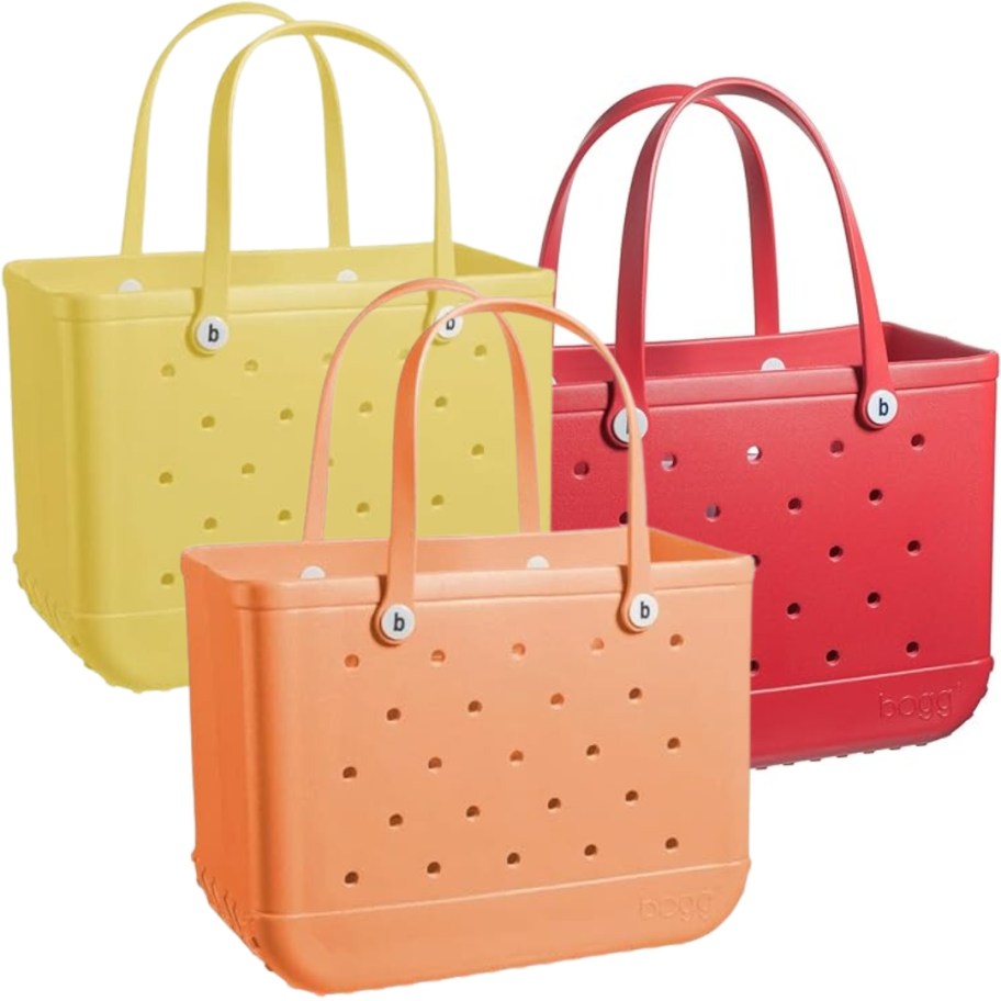 3 extra large Bogg bags in yellow, red, and light orange