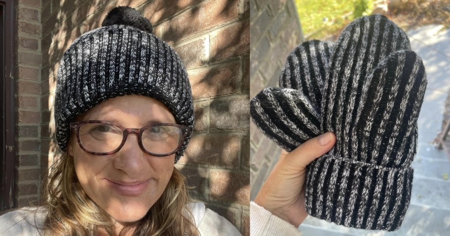 woman wearing a black and grey beanie with pom pom and a hand holding a pair of matching mittens