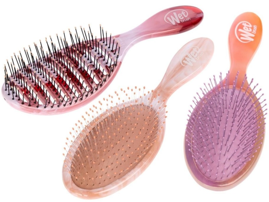 3 Wet Brush brand hair brushes in pink, tans, and light purple colors