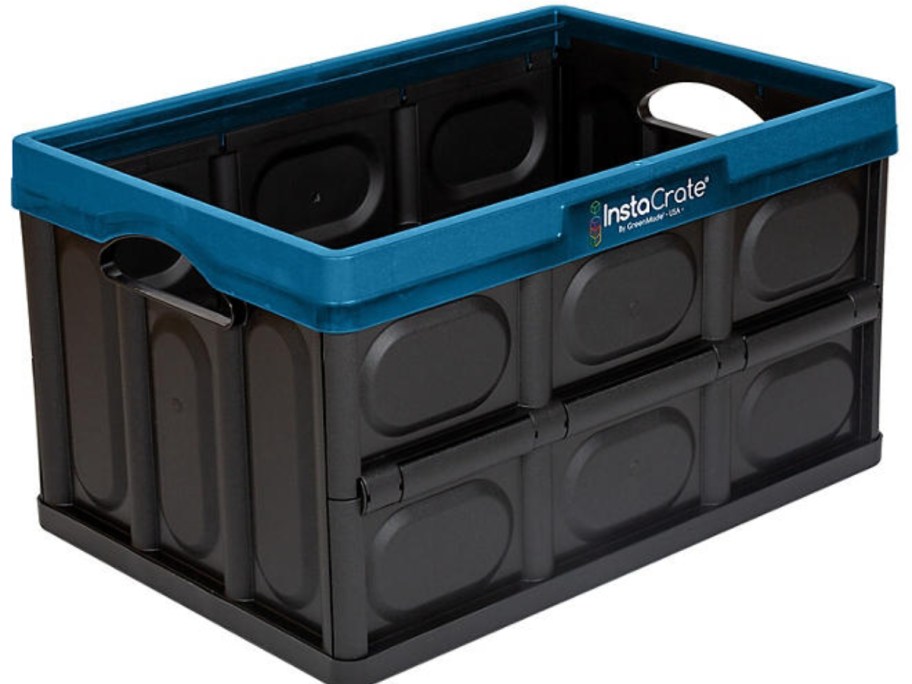 a collapsible plastic crate in black with blue around the top