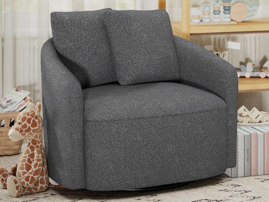 a dark grey kids swivel chair