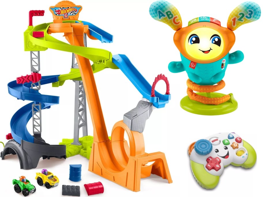 a large Fisher Price Hot Wheels toy car track playset, a musical interactive light up toy that looks like a little animal, and a toy video game controller