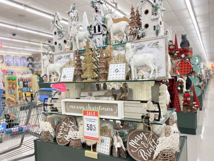 A display of Christmas Decor at Hobby Lobby with 50% off sale signs