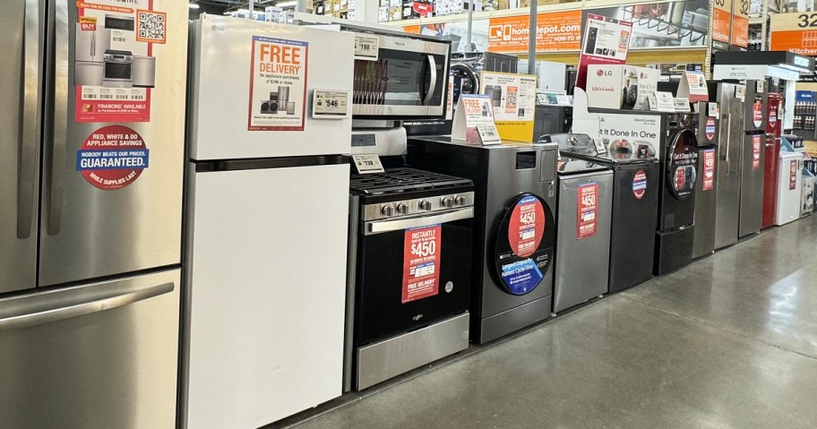 appliances in a row on display in home depot store