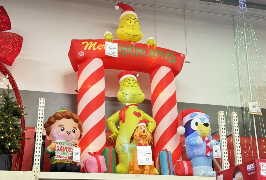 display of christmas inflatable in home depot store