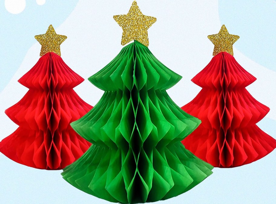 red and green paper christmas trees with glittery gold stars on top