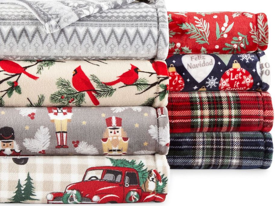 A stack of North Pole Trading Company Holiday Throws