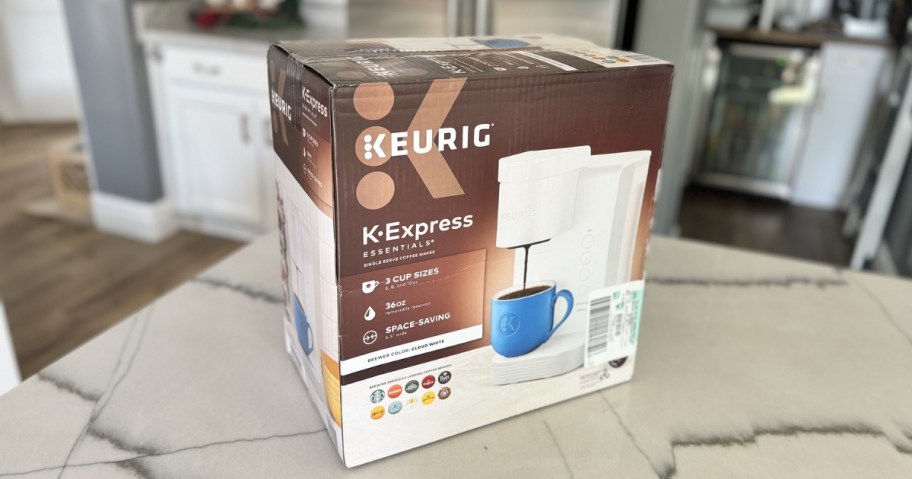 keurig k-expres coffee maker in box on countertop