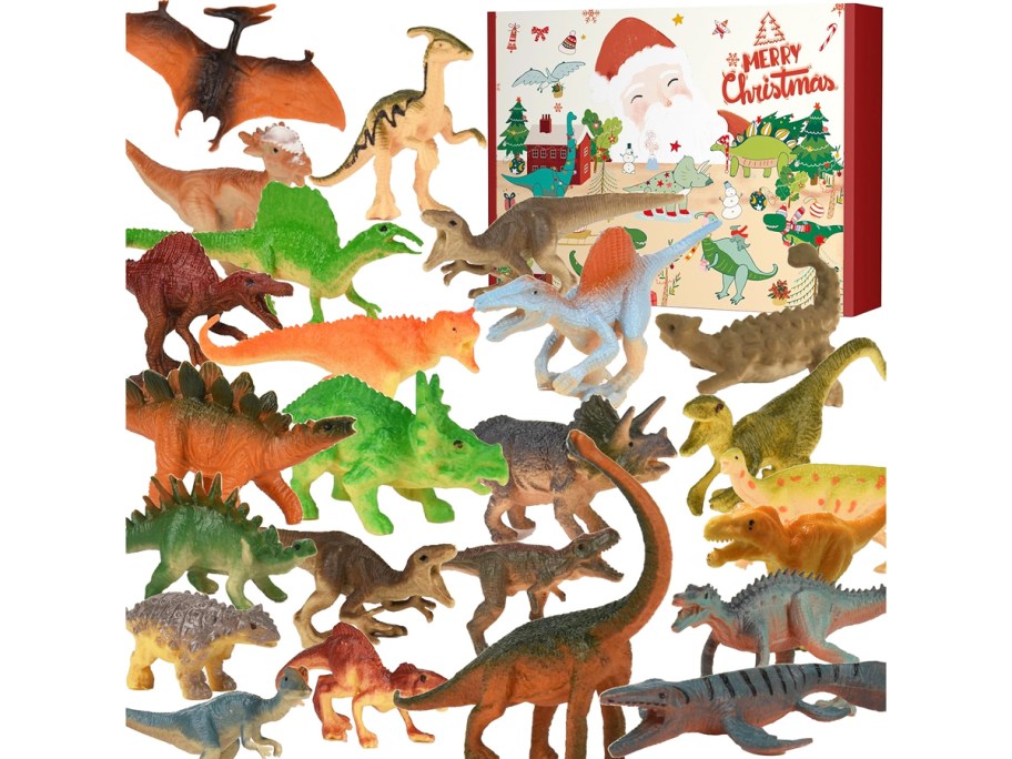 variety of plastic dinosaur toys in front of advent calendar box