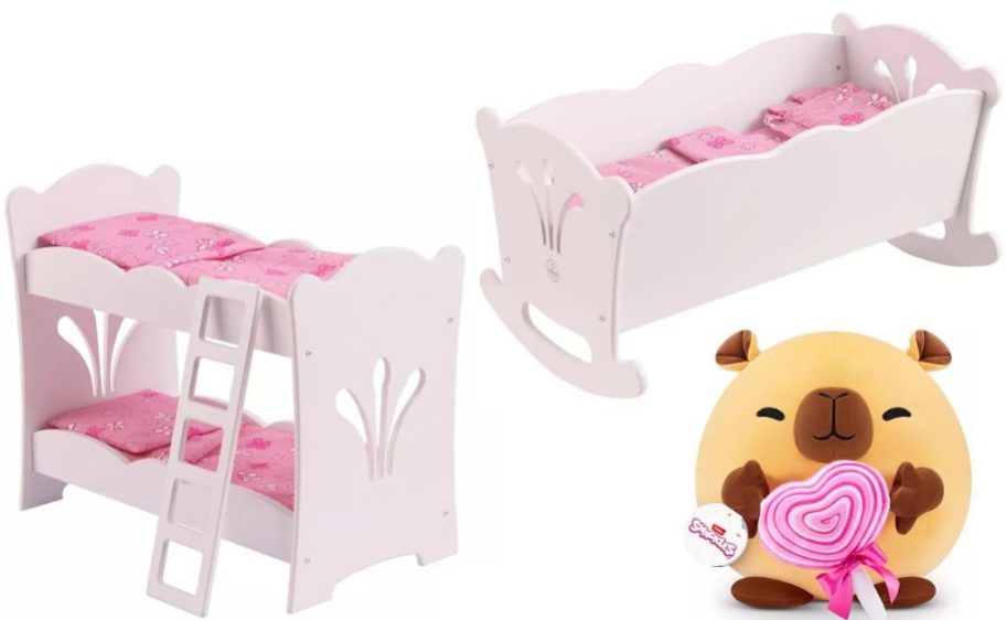 Stock images of two Kidkraft Doll beds and a snackles plush