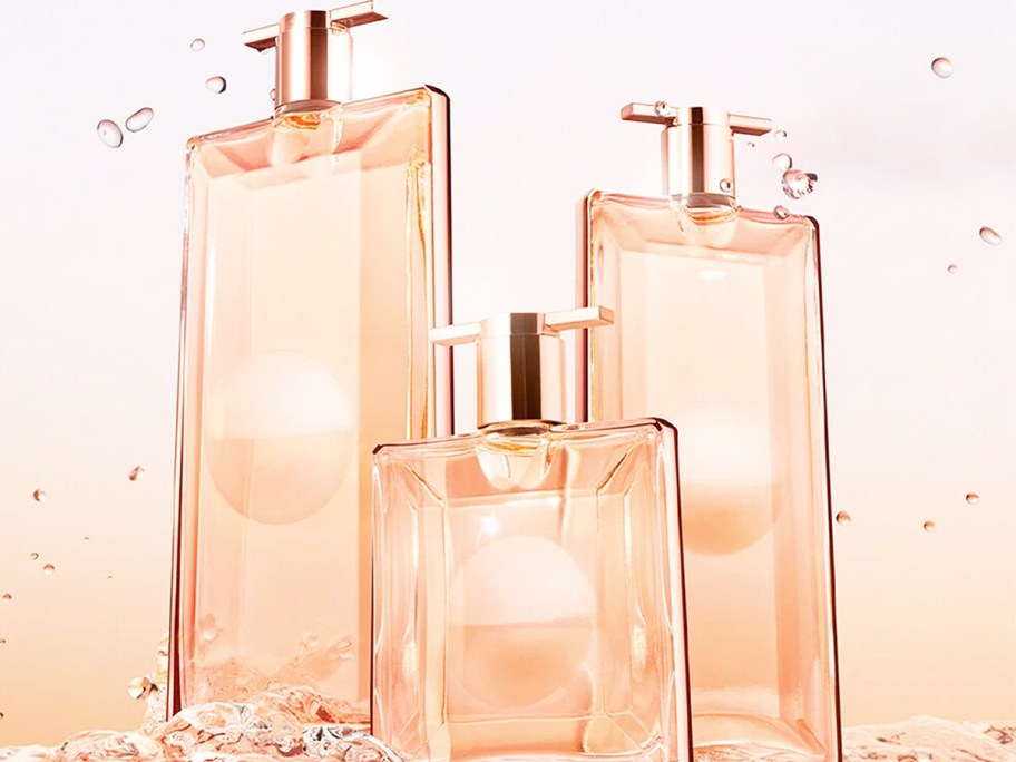 three bottles of Lancome Idôle Eau de Toilette