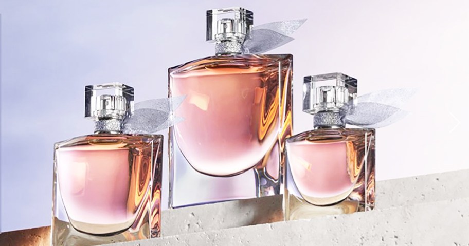 three bottles of Lancome La Vie Est Belle Eau de Parfum