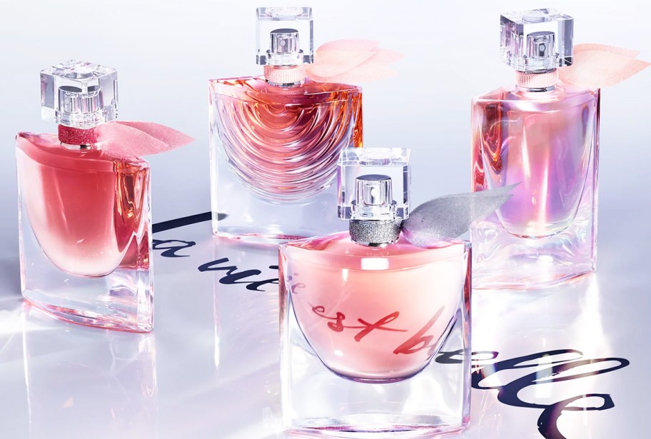 multiple pink bottles of Lancome Perfumes