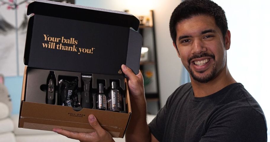 Man holding a Manscaped Grooming Kit