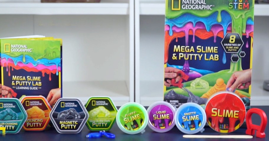 colorful jars of slime and putty in a row on a table