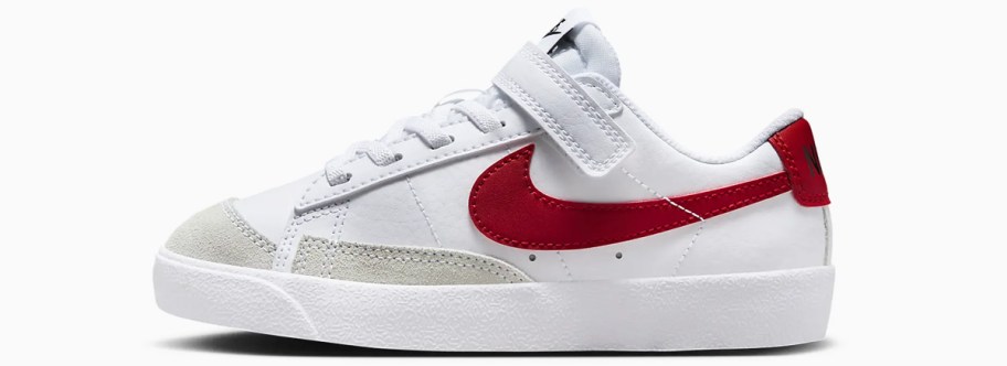 white and red nike shoe