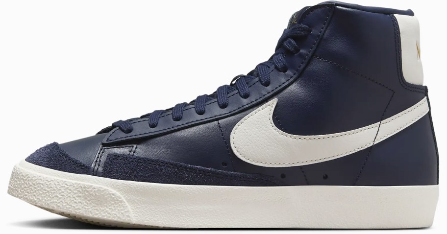 navy blue and white high top nike sneaker