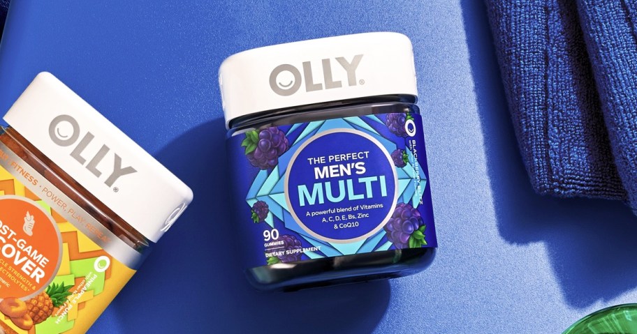 blue bottle of OLLY Men's Multivitamin Gummies on blue background