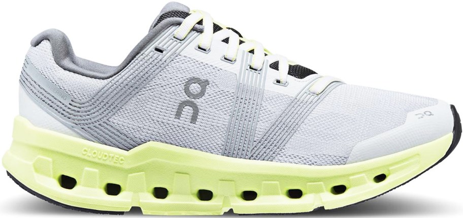 light grey running shoe with light yellow soles