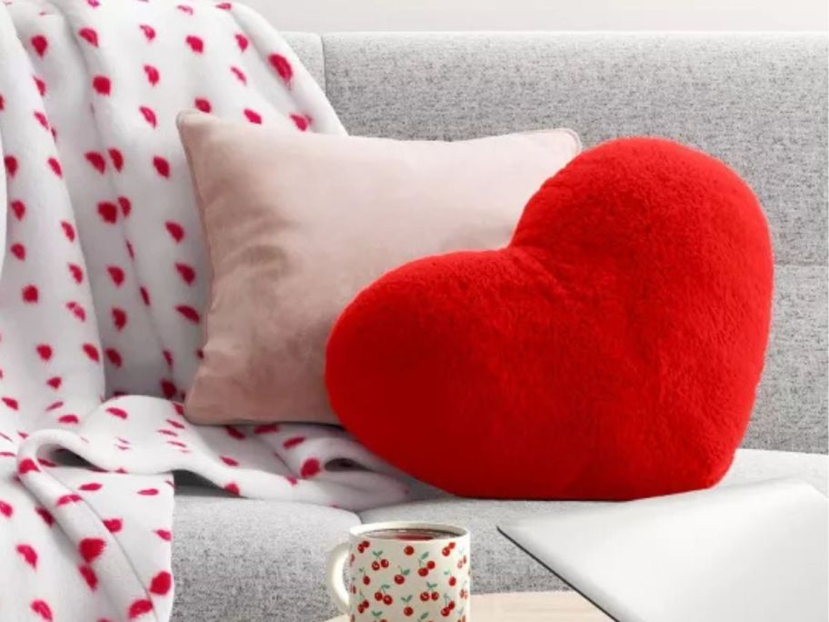 Room Essentials Plush Shaped Heart Throw Pillow - Red on couch