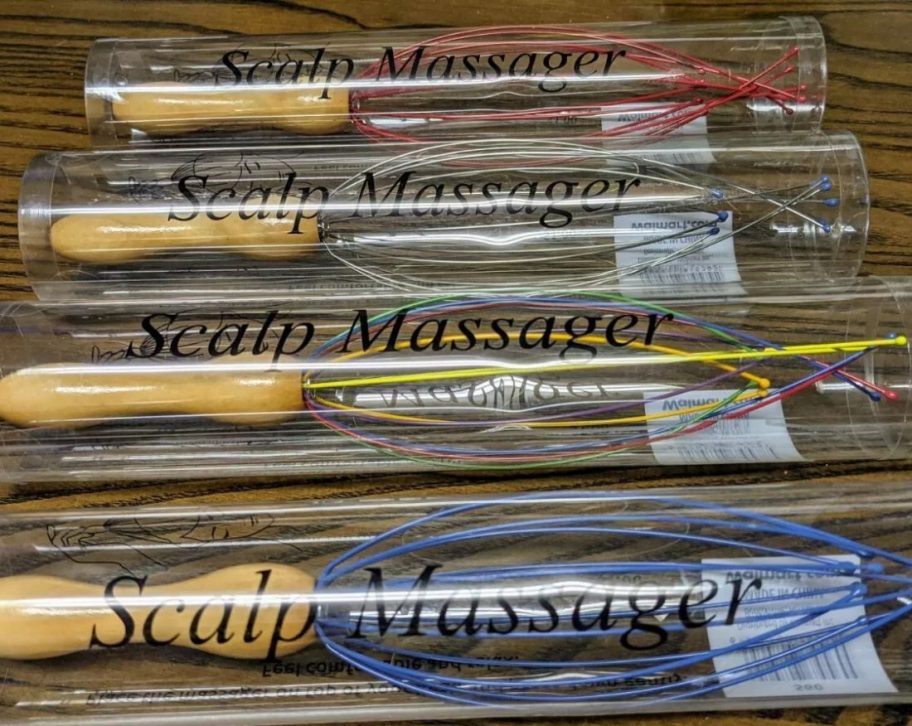 A number of Scalp Massagers on a table