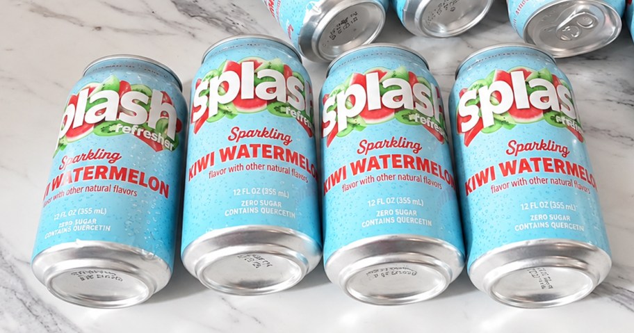4 cans of Splash Kiwi Watermelon Sparkling Water laying on a counter