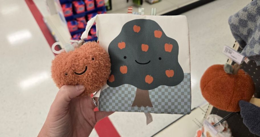 A push book with an apple and a tree