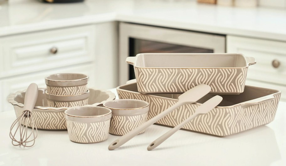 gray and white bakeware on white kitchen counter