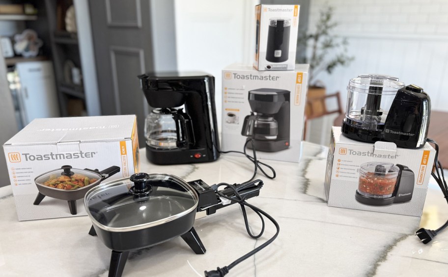 black small kitchen appliances on counter