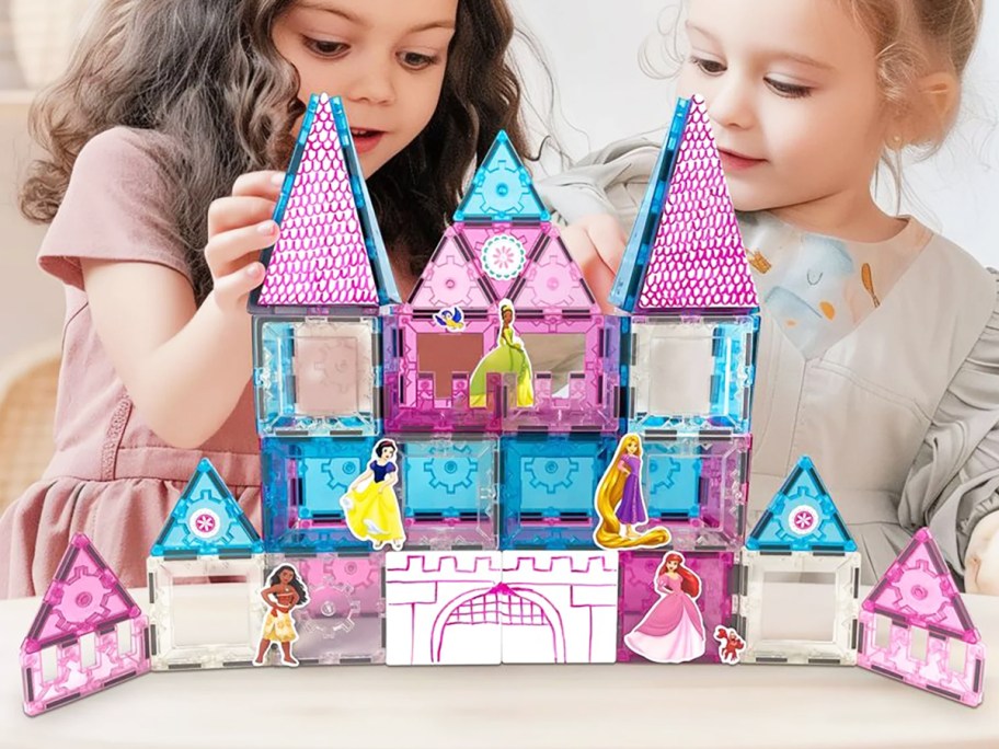 two girls playing with Tytan Tiles Disney Princess magnetic tiles set