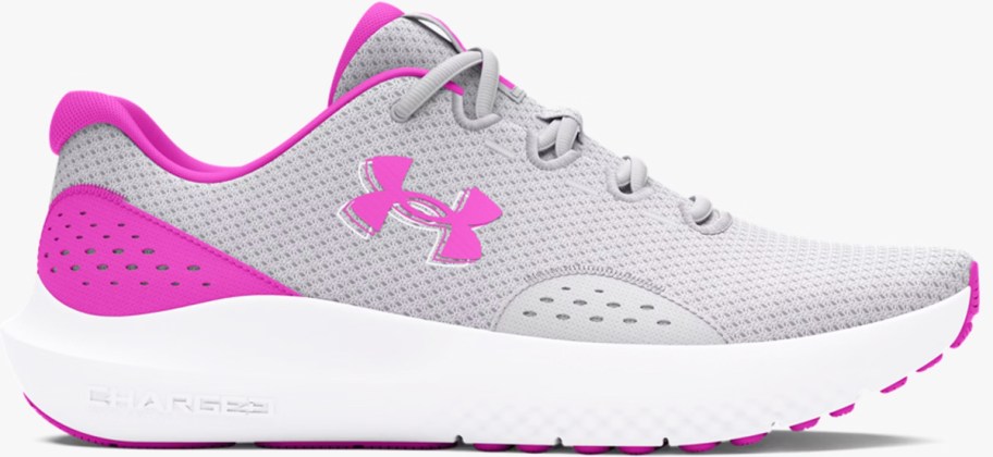 grey and pink under armour running shoe