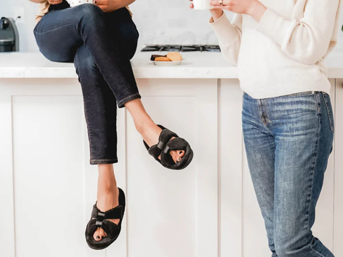 woman sitting on counter cross legged wearing Women’s Microterry with Satin X-Slide Slippers