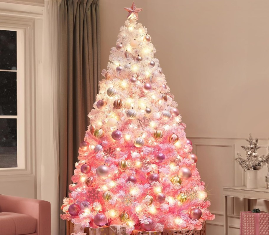 Yaheetech Christmas pink tree displayed in the living room