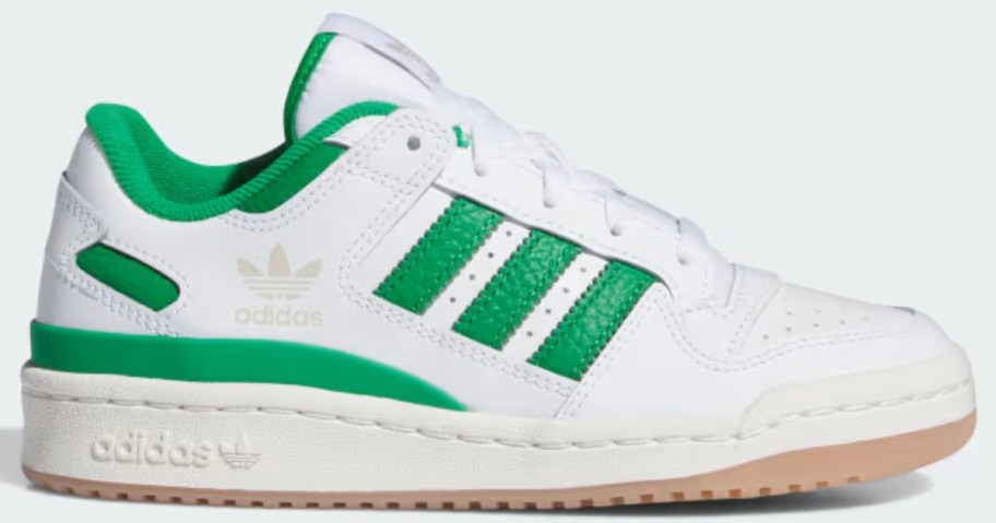 kid's adidas sneaker in white with green accents