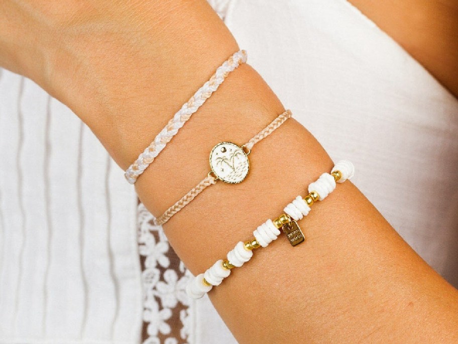 arm wearing Pura Vida Puka shell bracelet