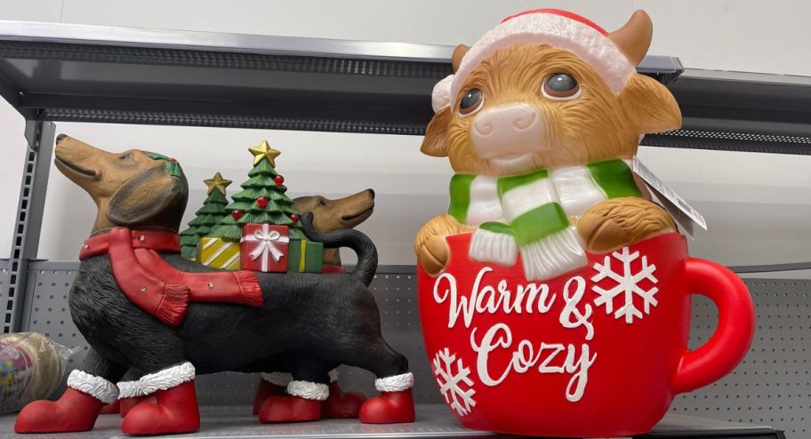 Christmas dog and cow blow molds at walmart on display