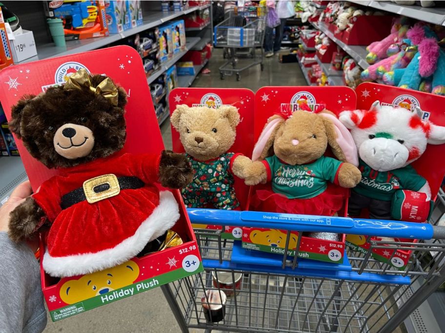 4 build a bear plushes in a shopping cart 