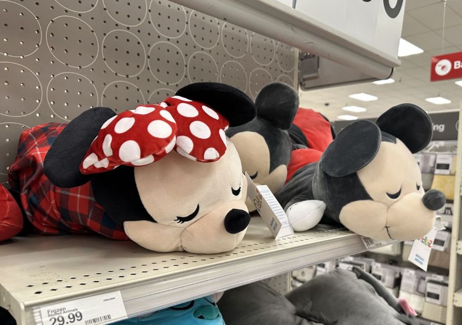 minnie and mickey mouse cuddleez on a store shelf