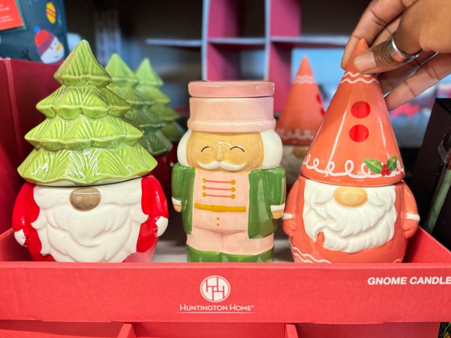 display of gnome candles on the shelf