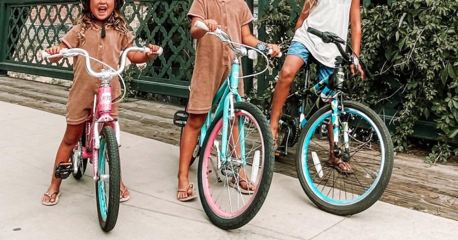three people on guardian bikes