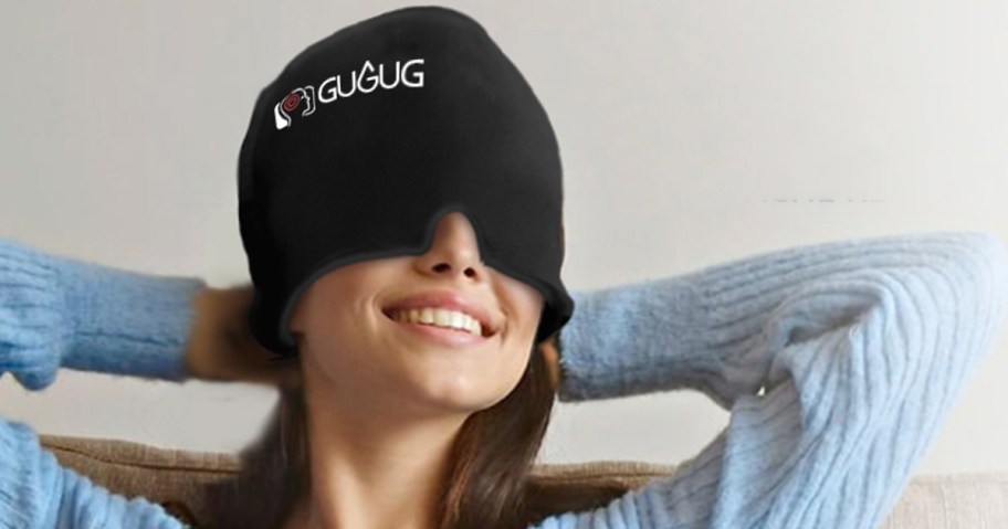 woman wearing migraine cap