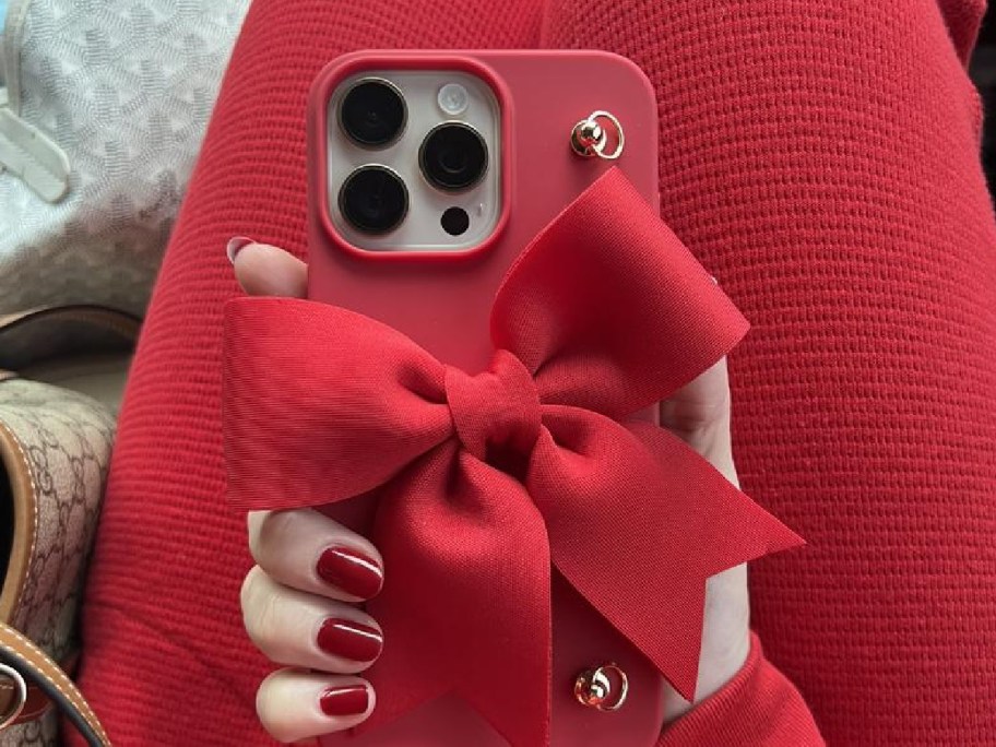 hand holding bow iphone case