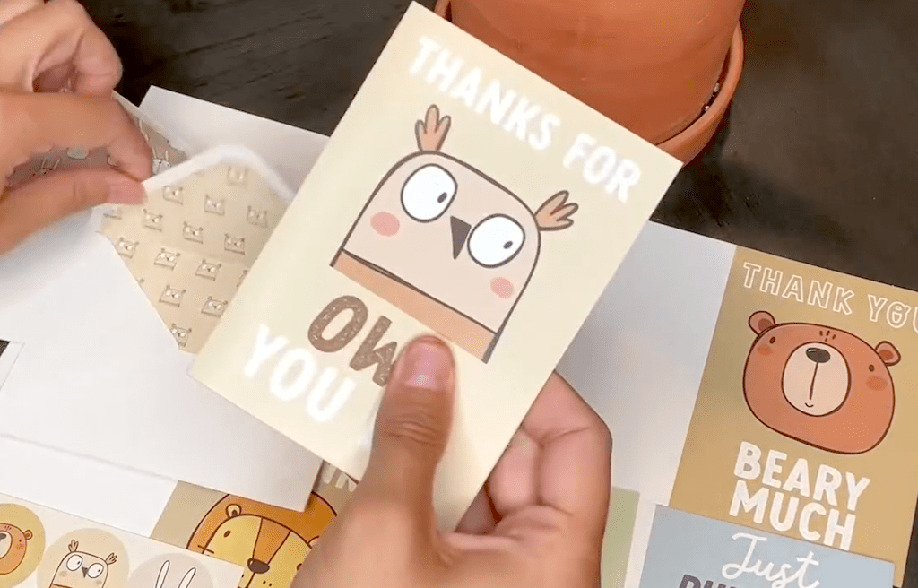 holding thank you card 