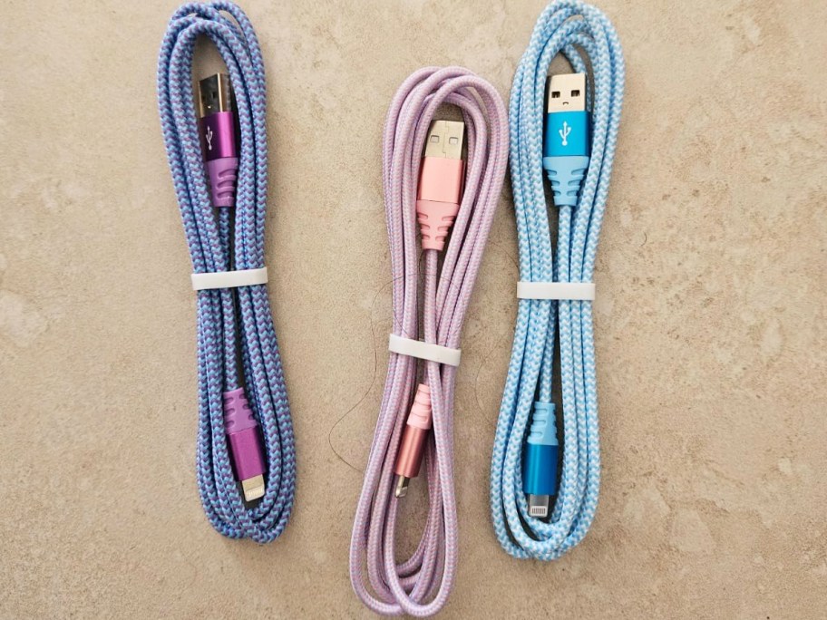 purple, pink, and blue iphone charging cables