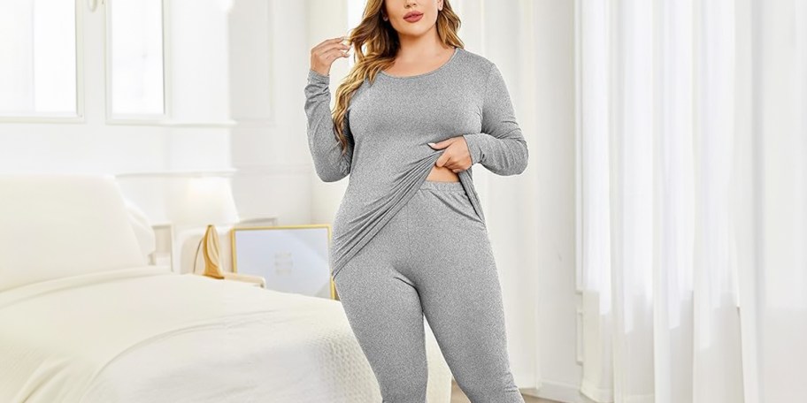 woman wearing gray lounge set in room 