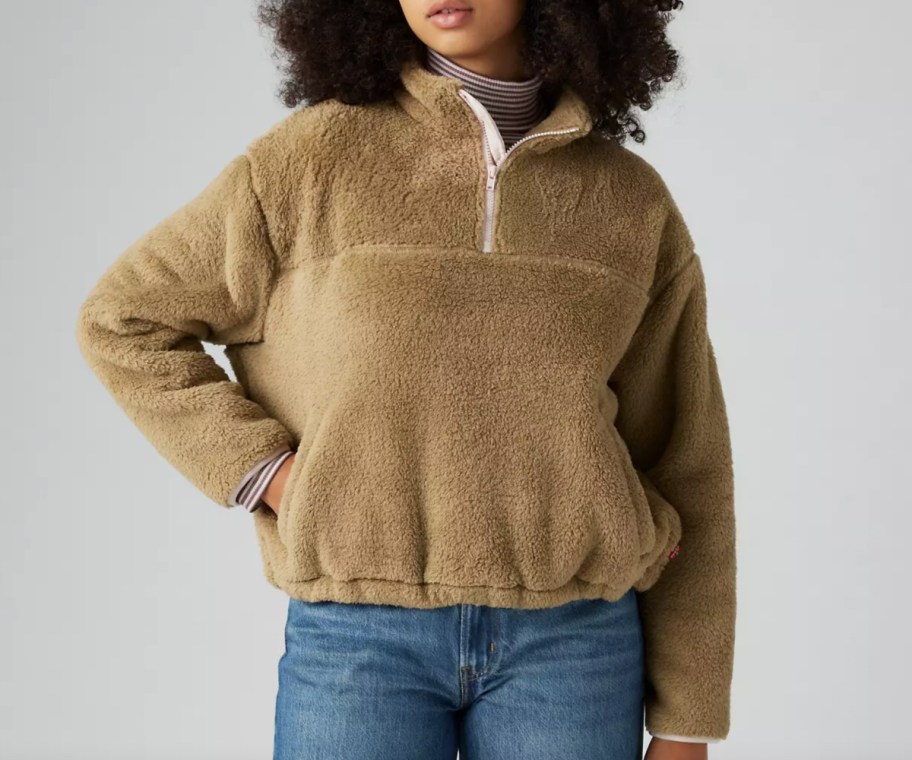 woman in brown sherpa sweatshirt