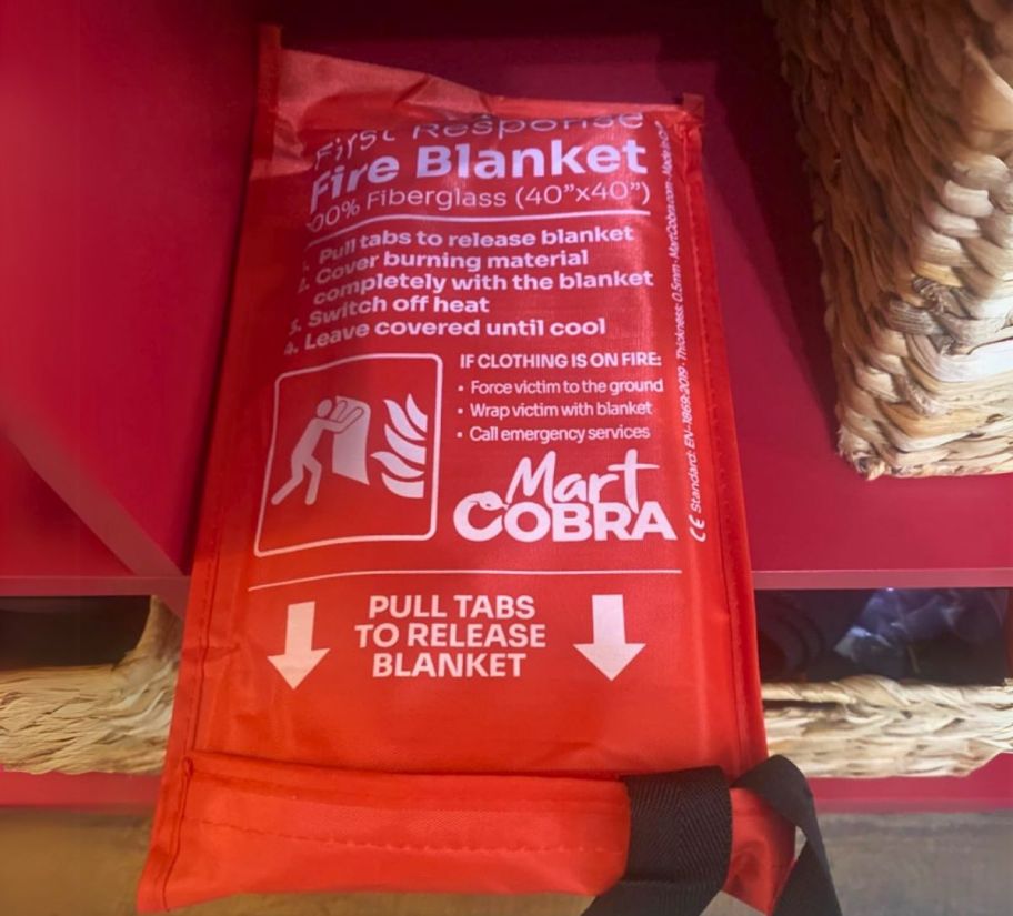 a fire blanket on a closet shelf