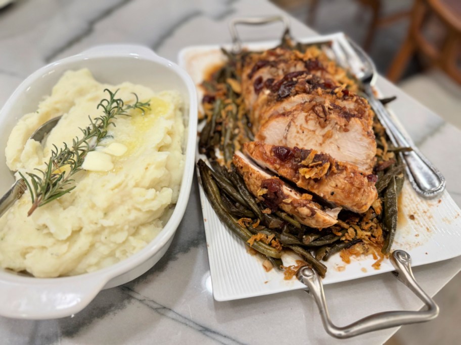 mashed potatoes and slow cooker turkey on plates 