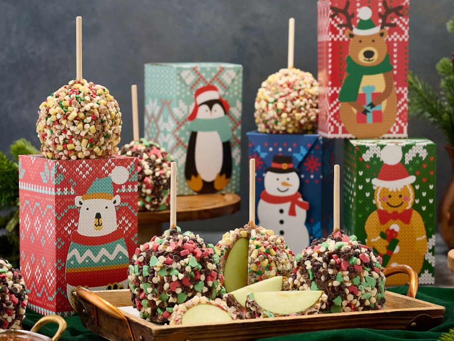 caramel apples with holiday gift boxes