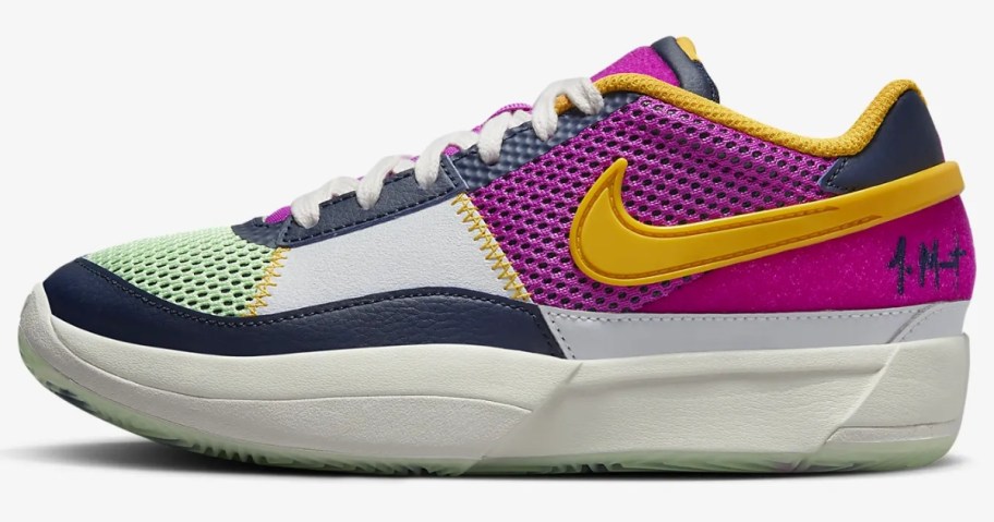 kid's Nike sneaker in white with purple, yellow, black and grey accents